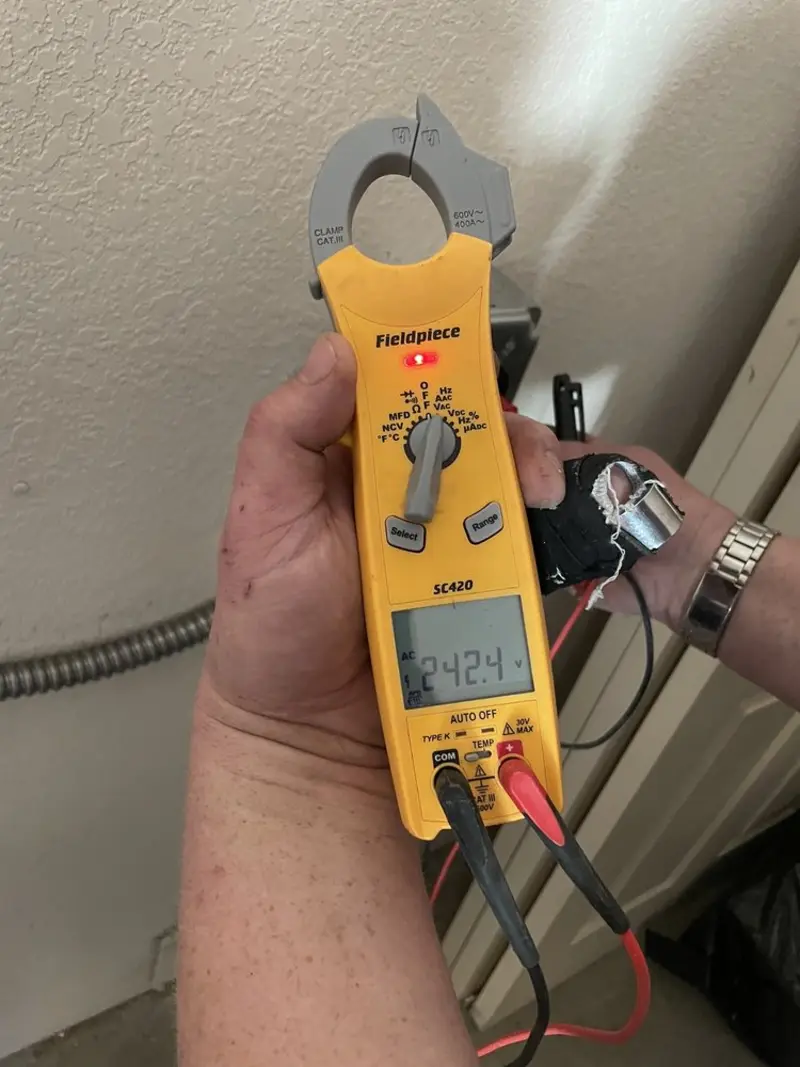 Voltage testing with clamp meter during Aluminum Wiring Replacement in Hampton